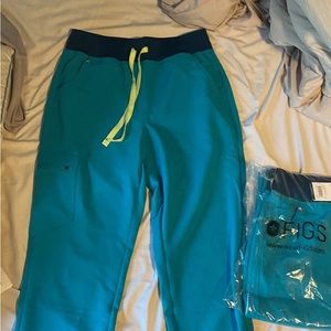 2 pairs of FIGS teal high waisted zamora jogger scrub pants